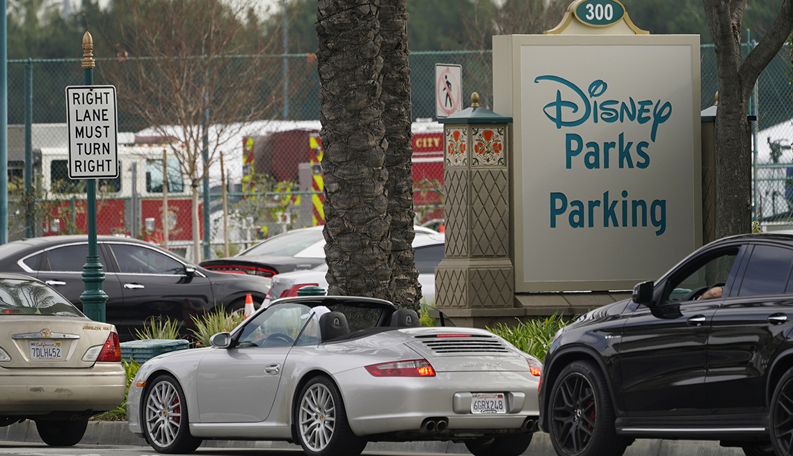 item 2 of Gallery image - cars lined up at a covid vaccination site in the disneyland parking lot in anahiem california