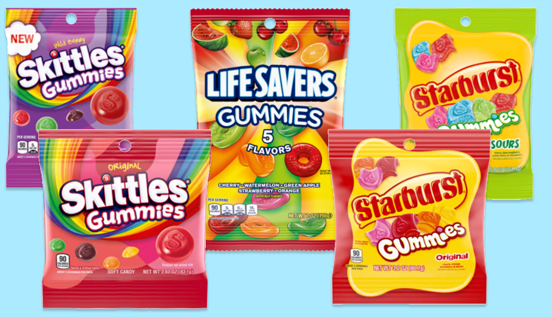 assortment of gummy candy packets from skittles lifesavers and startburst candies that have been recalled in may twenty twenty two