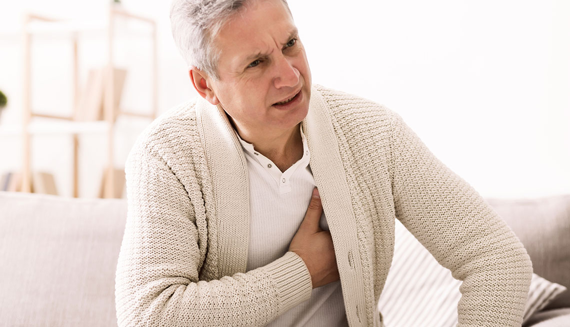 man with chest pain, suffering from heart attack