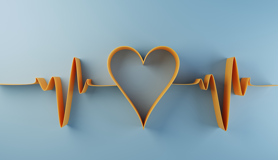 digital generated heart shape with pulse trace in orange on a light blue background