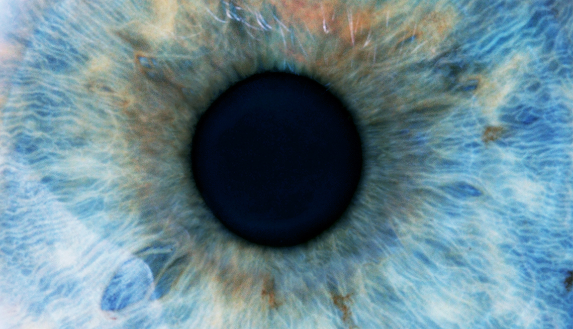 close up of a blue dilated eye