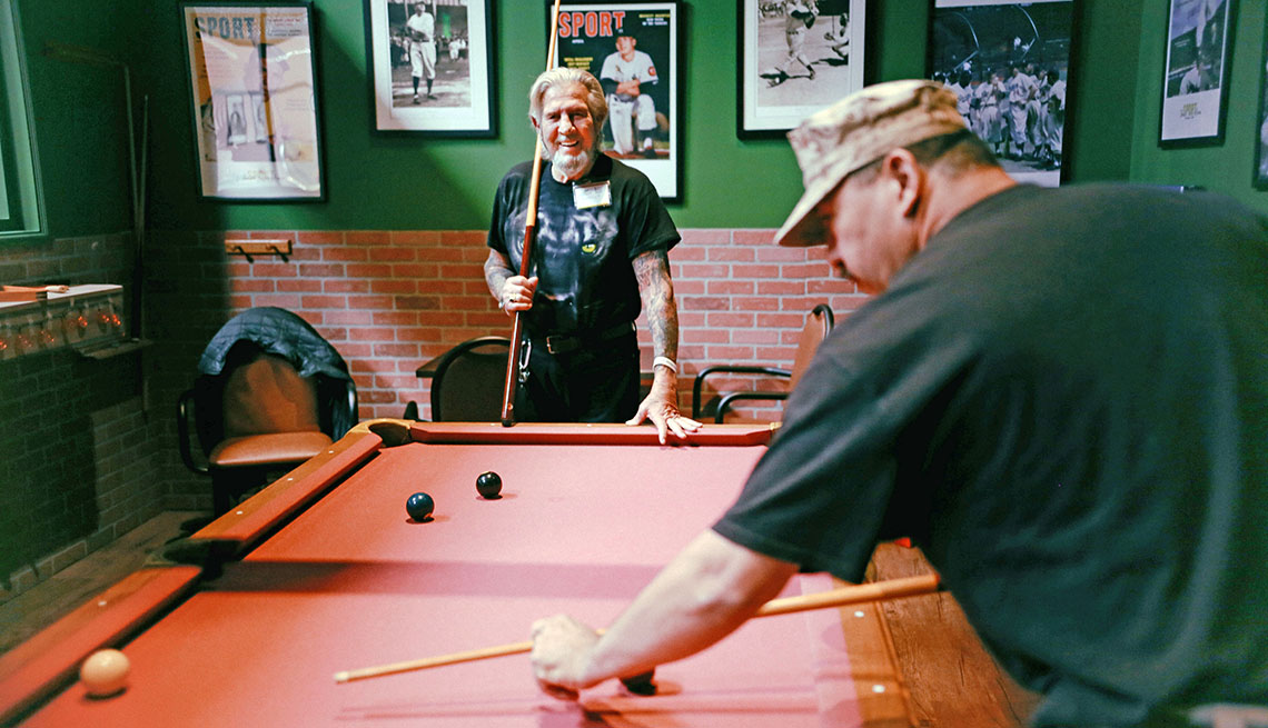 James Gibavitch plays pool in a bar designed to mimic the 1950s.