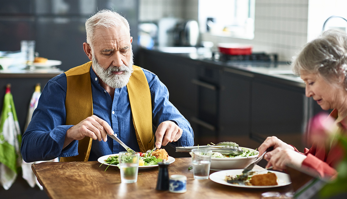 Older couple eating meal