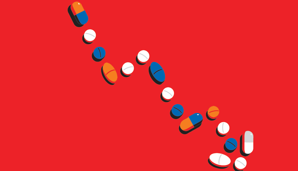 Diferentes pastillas sobre un fondo rojo