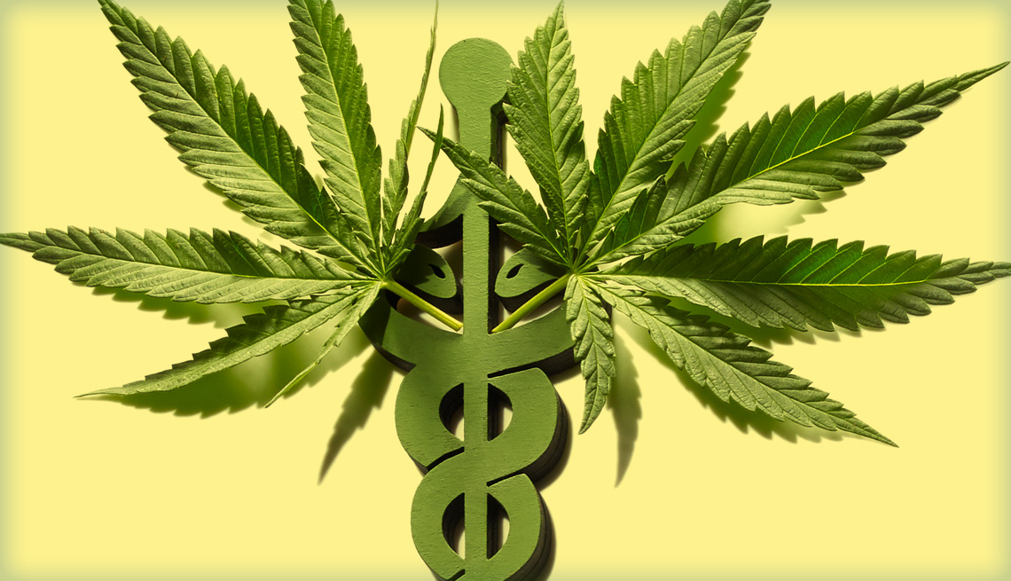 Dos plantas de marihuana insertadas en símbolo médico