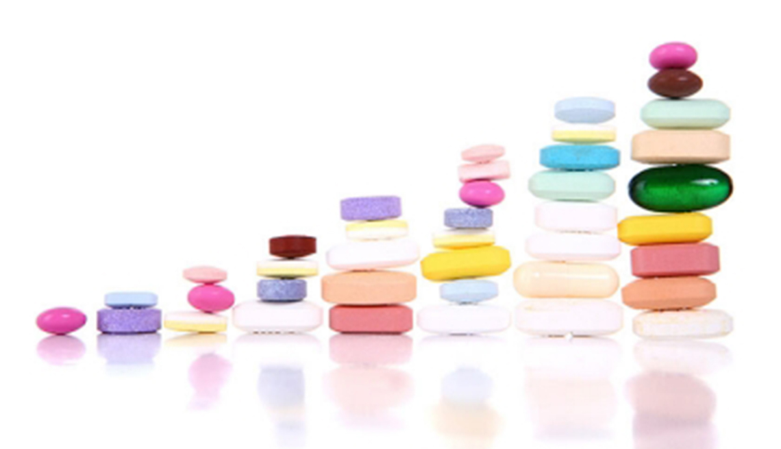 Piles of pills, medication, Medicare Open Enrollment 2014