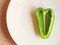 Half of a green pepper on a plate - study shows diet trumps genes when it comes to heart disease