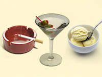 An ashtray, a martini and a bowl of ice cream. Overcoming bad habits.