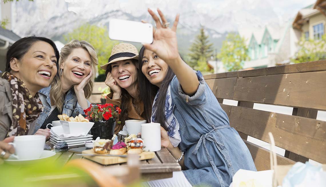 Women take a group selfie, Reduce Stress with friends