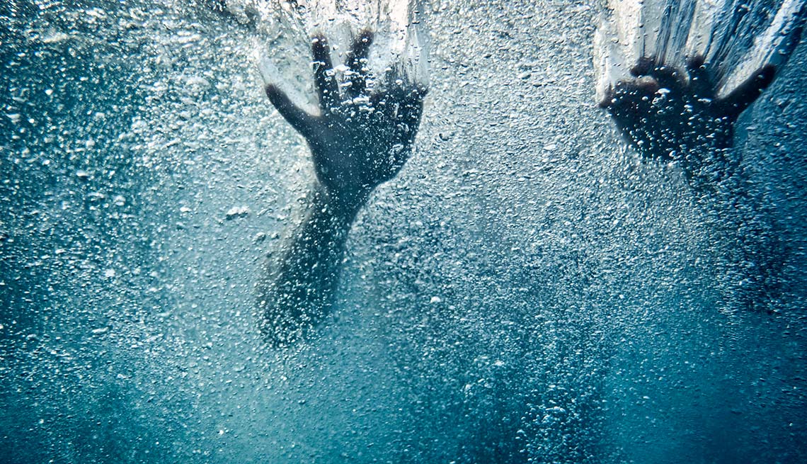 Hands and bubbles under water, Summer Survival Guide, Drowning