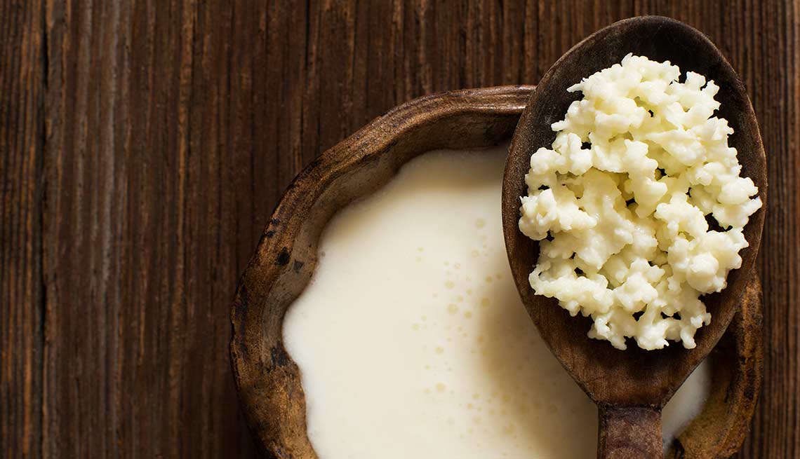 Kefir on a wooden spoon, Foods That Help Your Gut