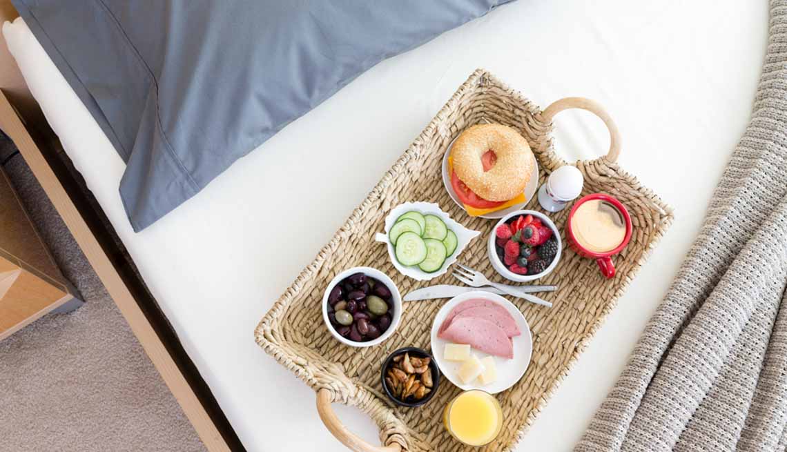 Breakfast Tray on Unmade Bed, Stay Healthy on Vacation 
