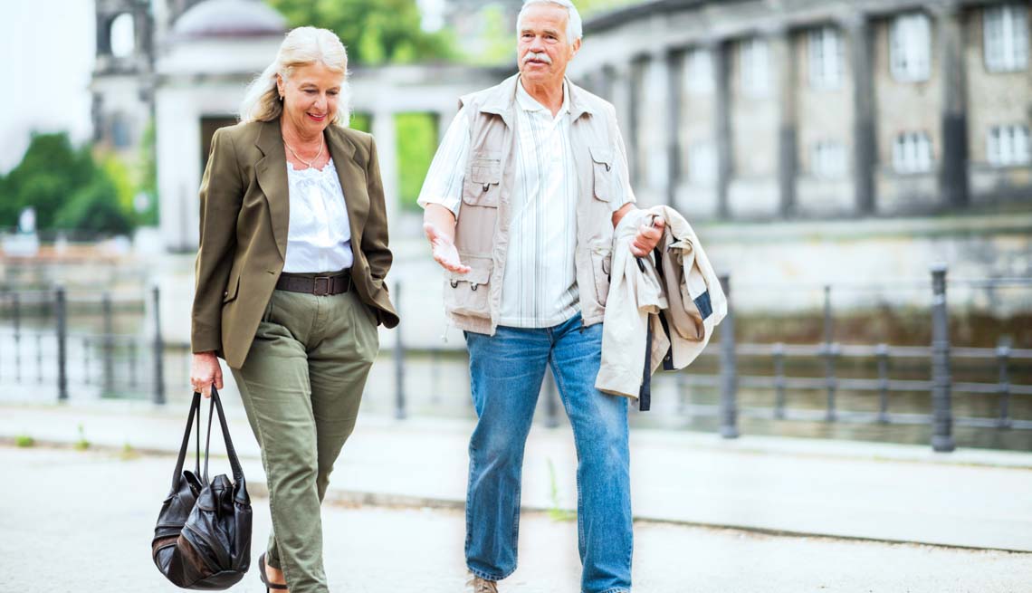 Couple walk on an old street, Stay Healthy on Vacation 