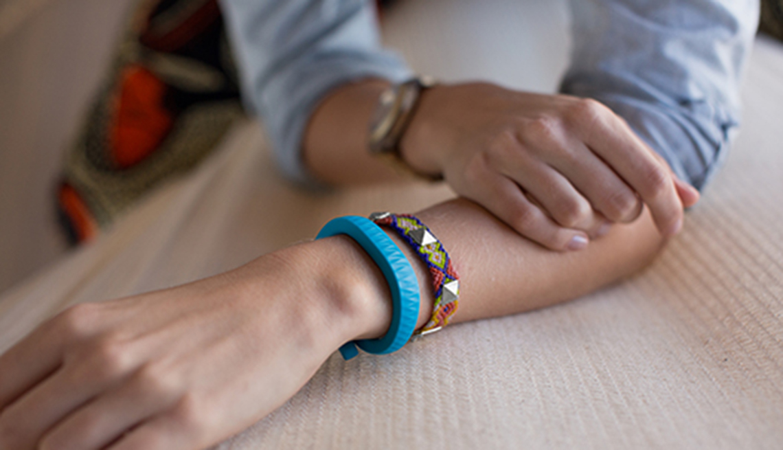 Fitness trackers, Woman wears bracelets, Healthy Holiday Gifts 