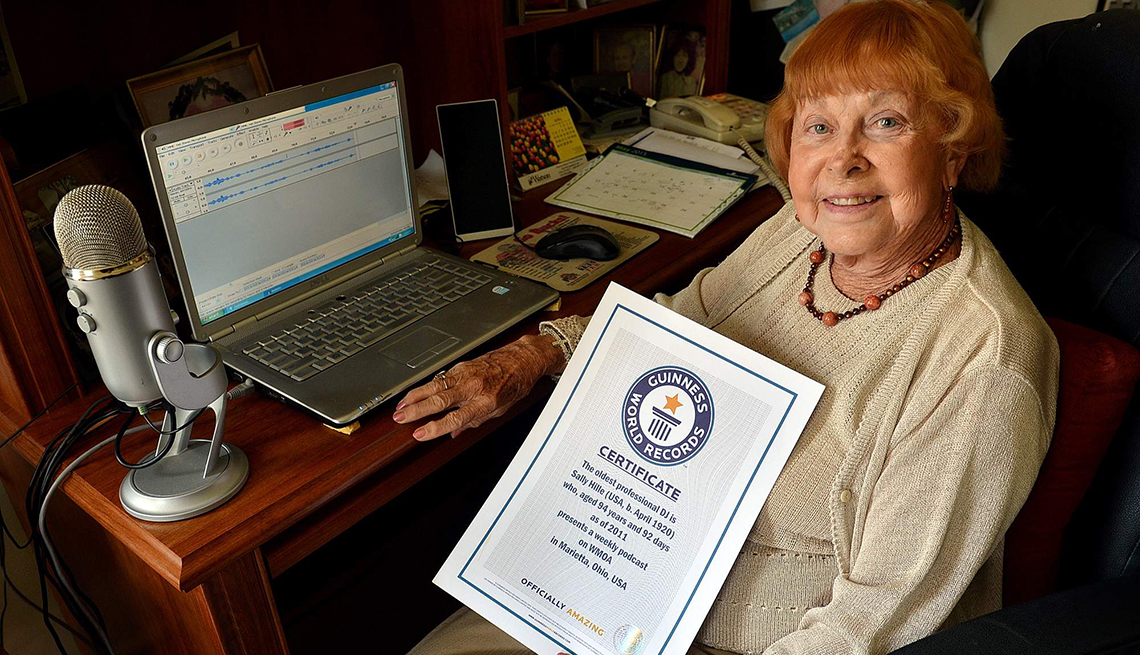 Sally Hille holding her certificate