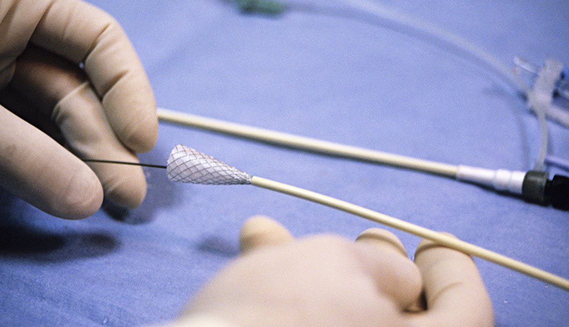 Mesh stent inserted into sheath.