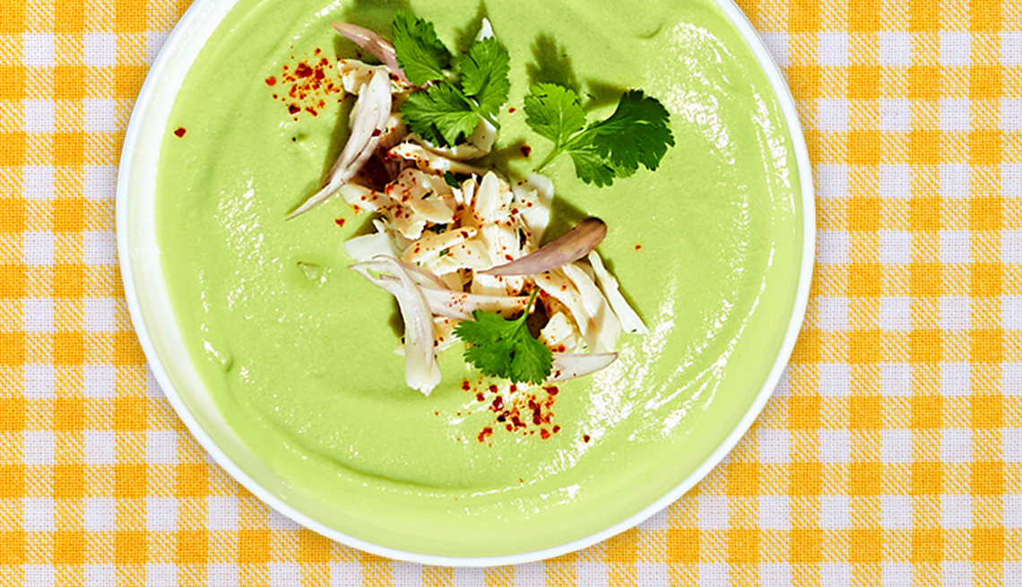bowl of no-cook avocado soup on a table