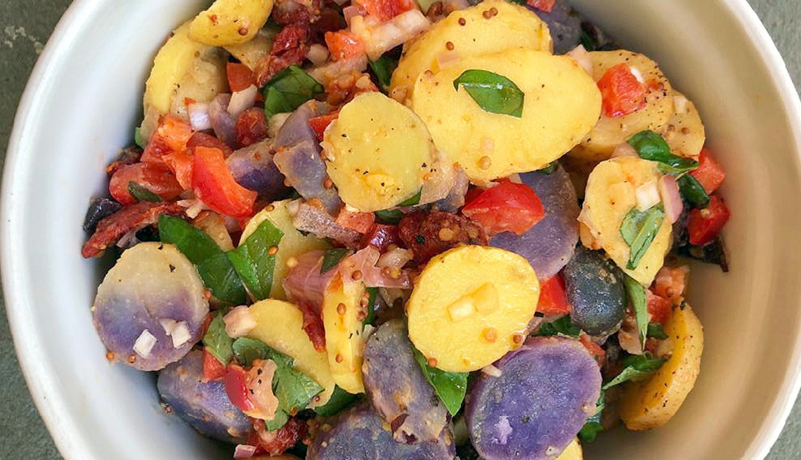 bowl full of red, white, and blue potato salad