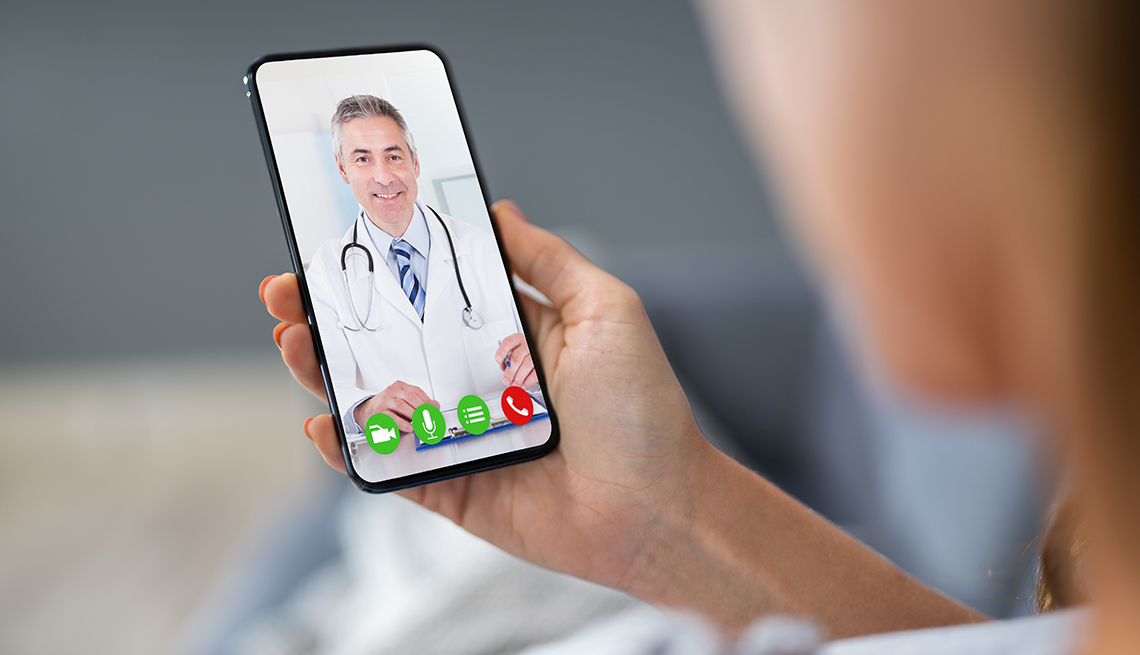 person having telehealth appointment with provider via mobile phone
