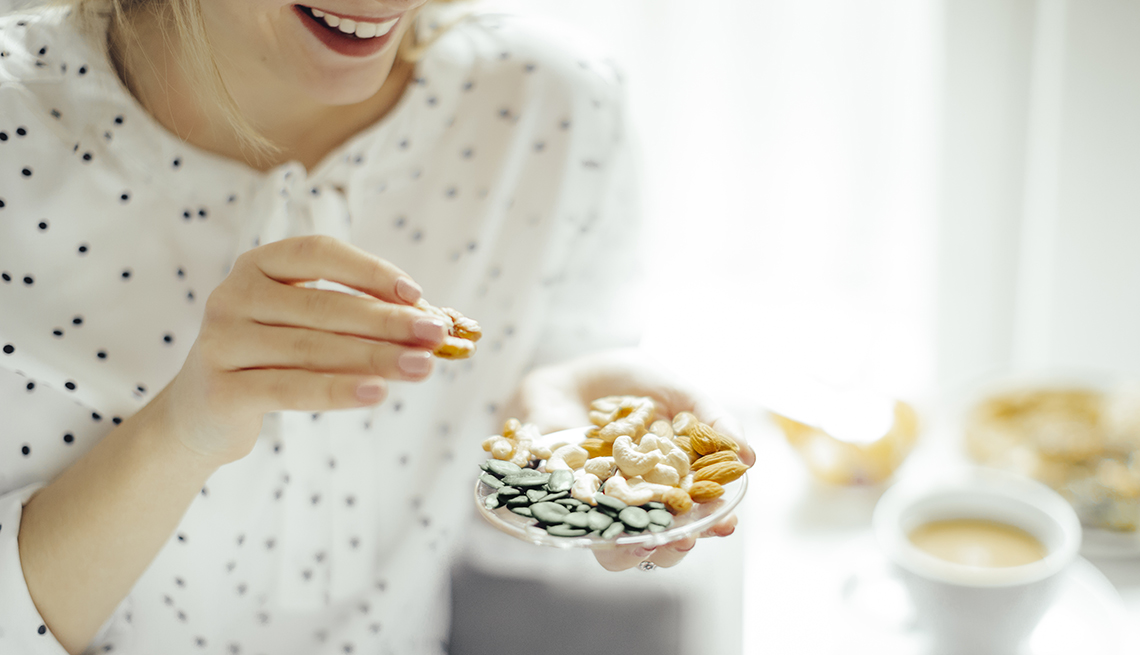 woman eating healthy snacks