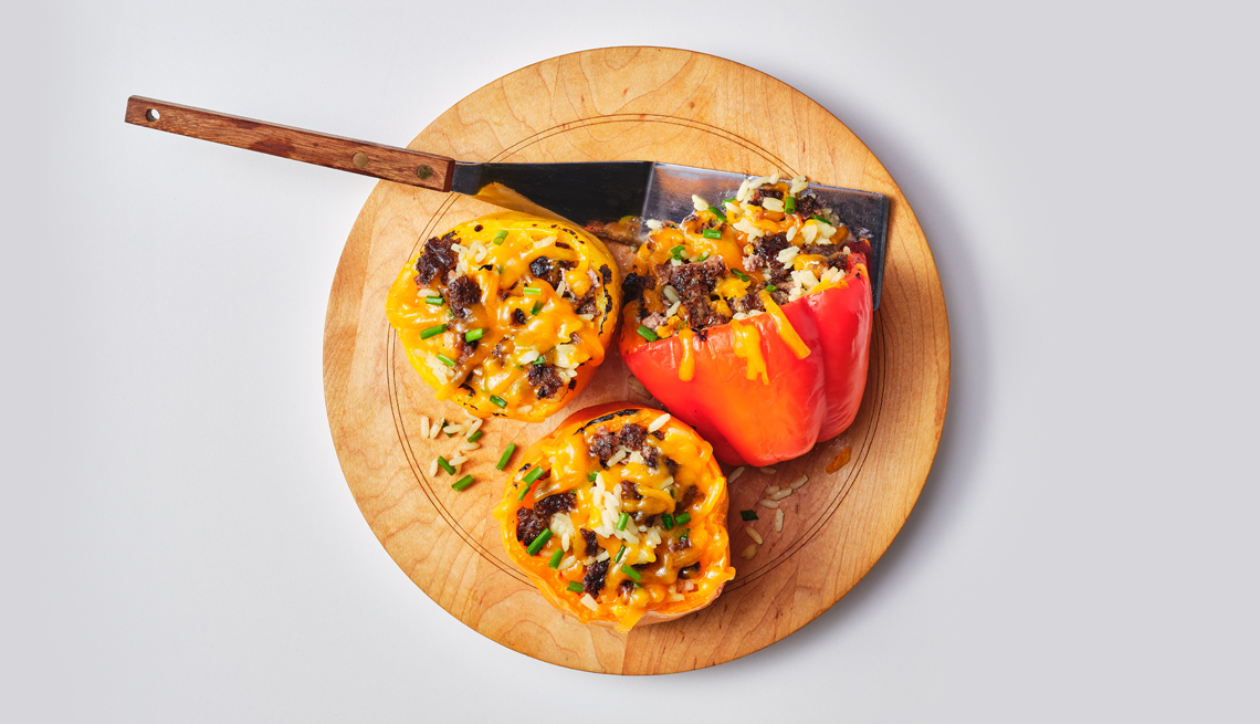 a plate of burger stuffed peppers