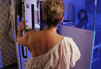 Woman getting mammogram-breast cancer mortality rates study