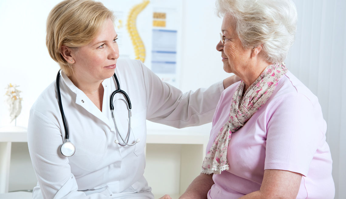 Doctor talking to a senior patient 