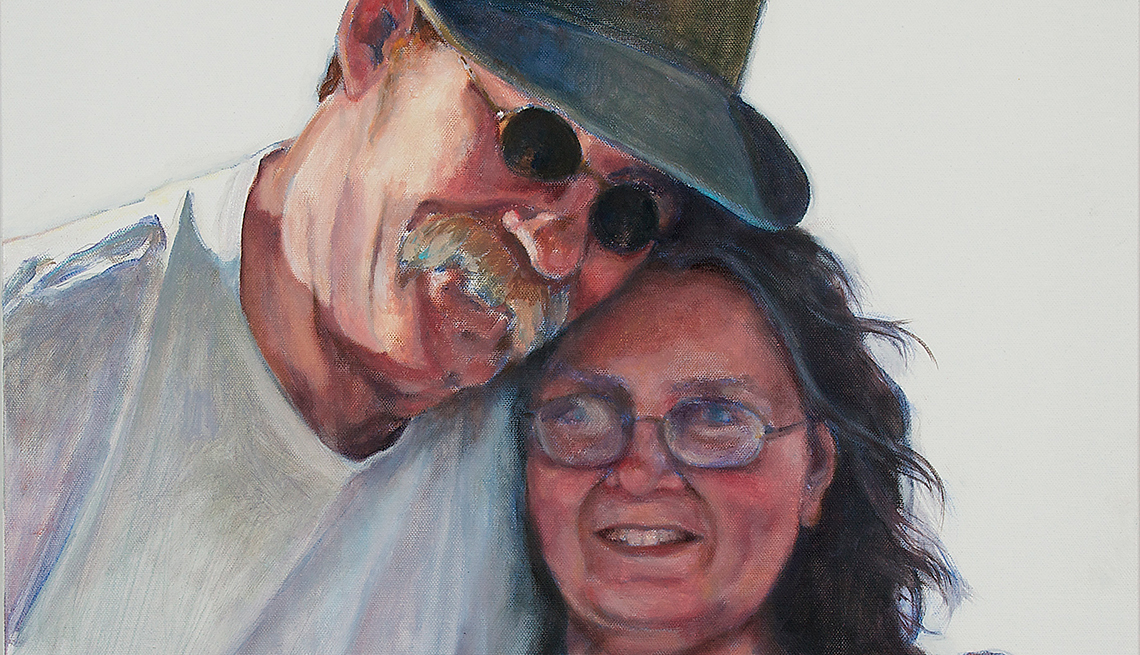 A painting of a man and woman hugging, named Teresa and Dean