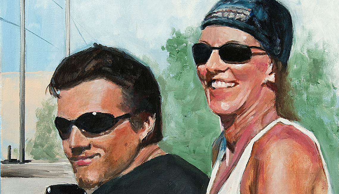 A man and a woman wearing sunglasses