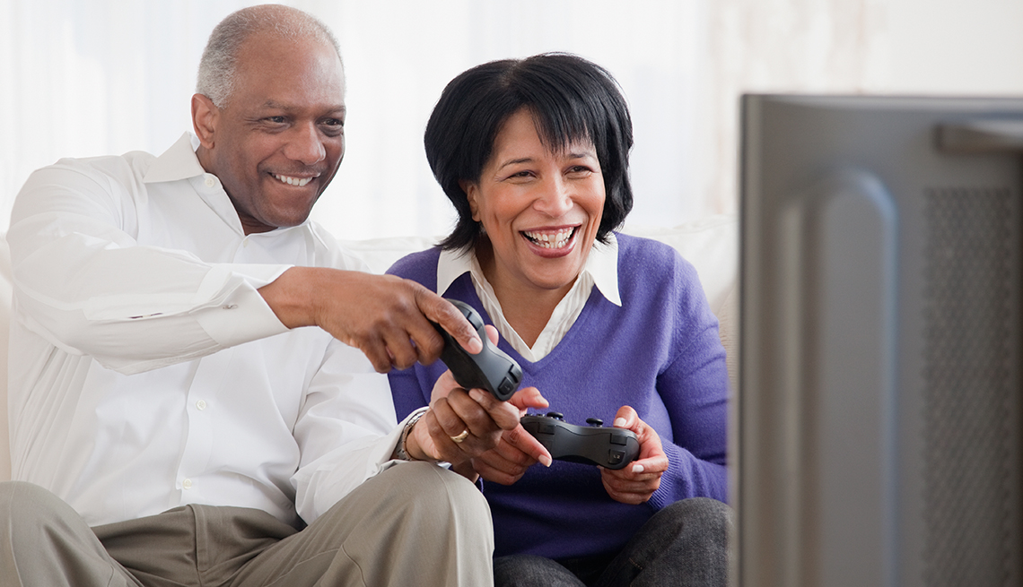 African American couple playing video games
