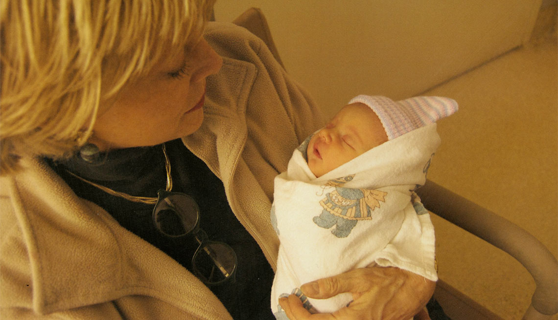 Lesley meeting baby Jordan for the first time