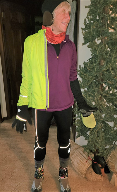 Jilly Whiting of Illinois wears many layers, a hat, gloves and wool socks when running in the winter. 