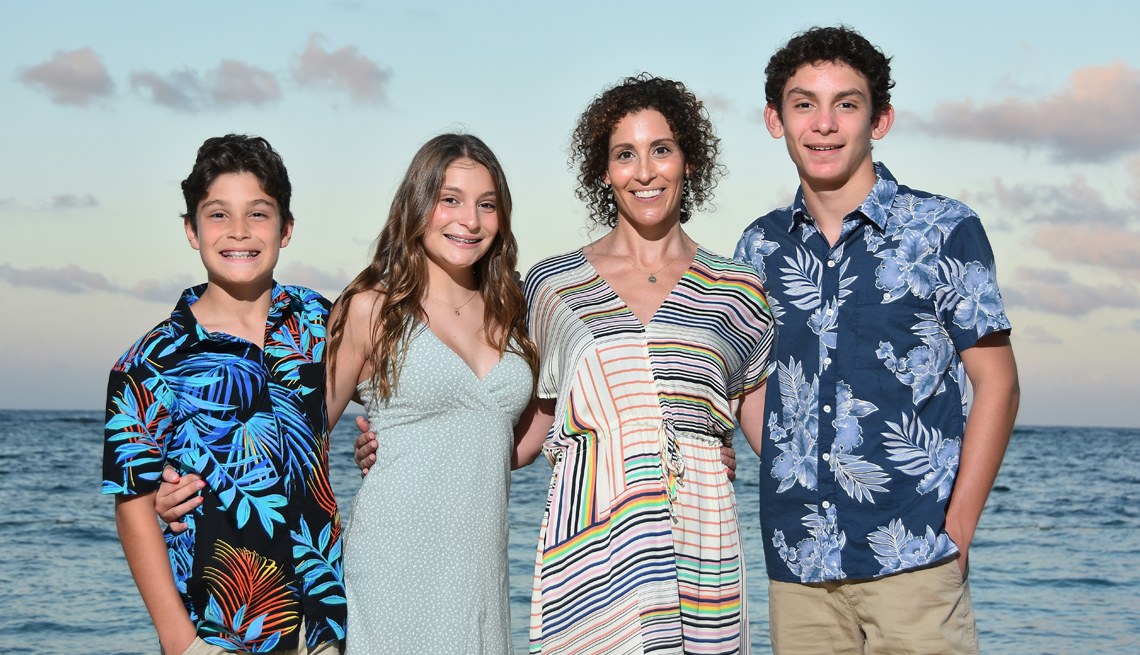 suzi menfi and her family on a group trip to jamaica