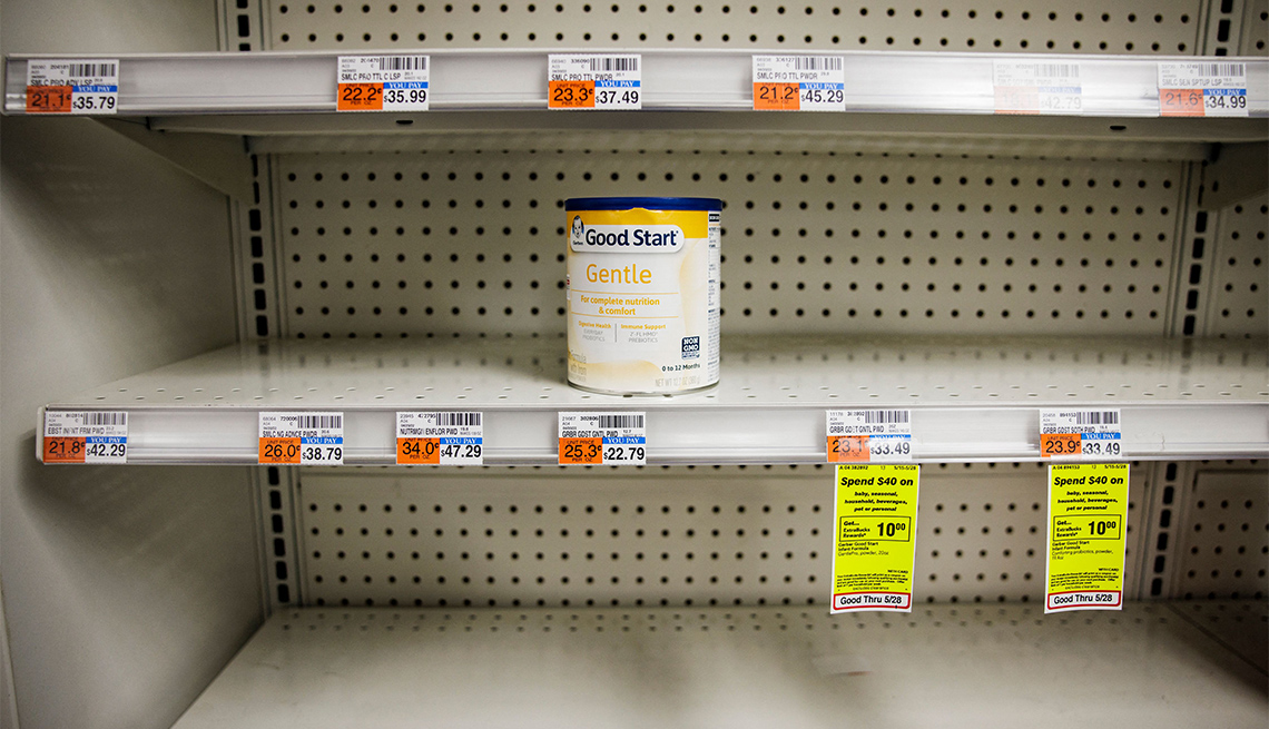 Shelves normally meant for baby formula sit empty at a store in downtown Washington, DC, on May 22, 2022