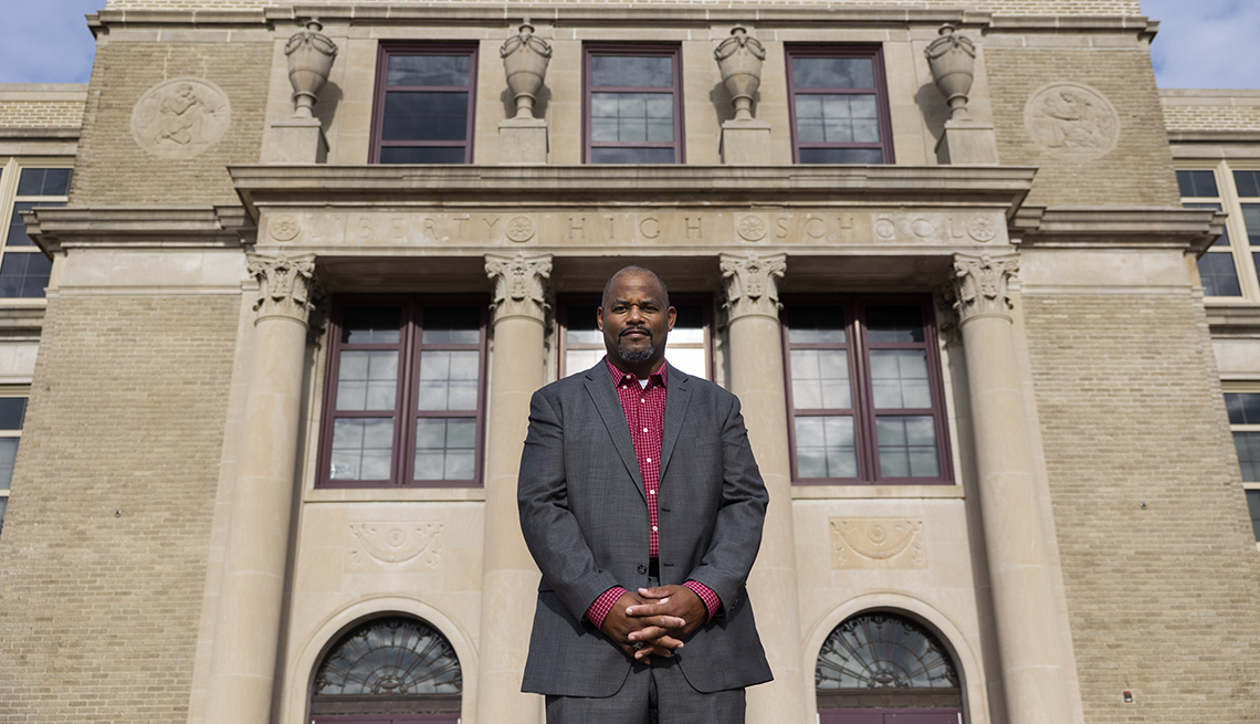 principal doctor harrison bailey the third in front of his school liberty high school