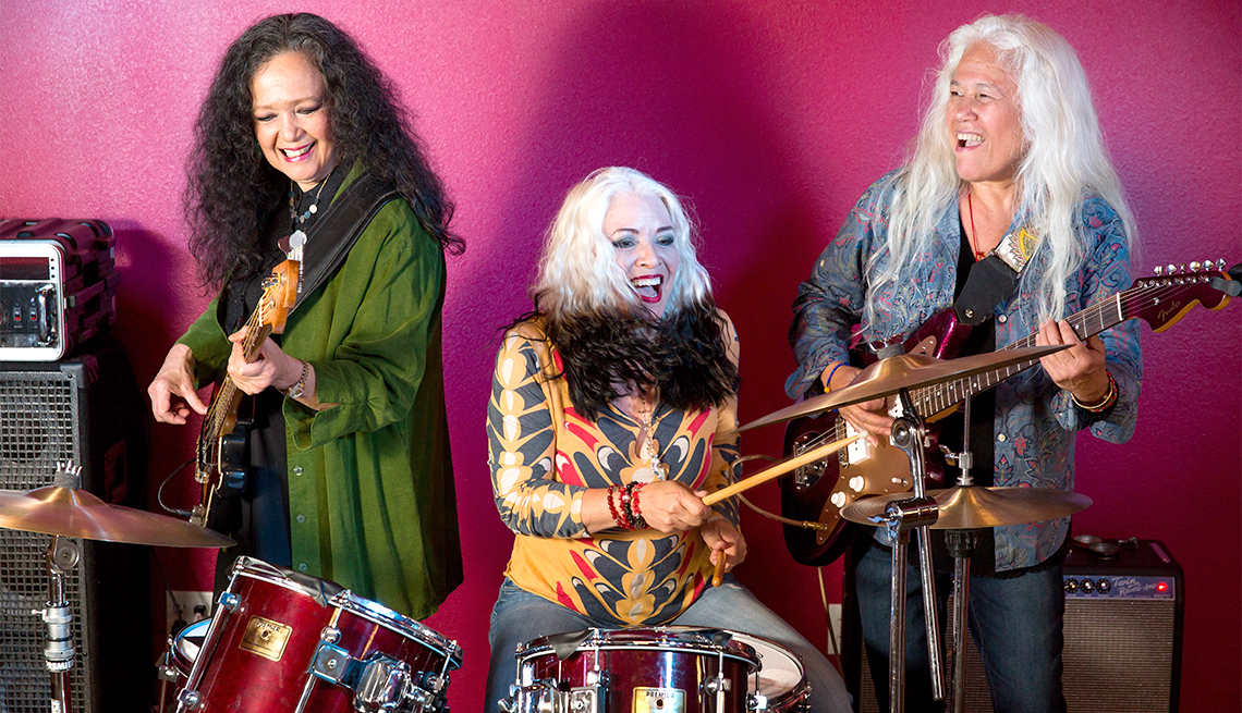 From left to right, Fanny band members bassist Jean Millington, drummer Brie Darling, and lead guitarist June Millington