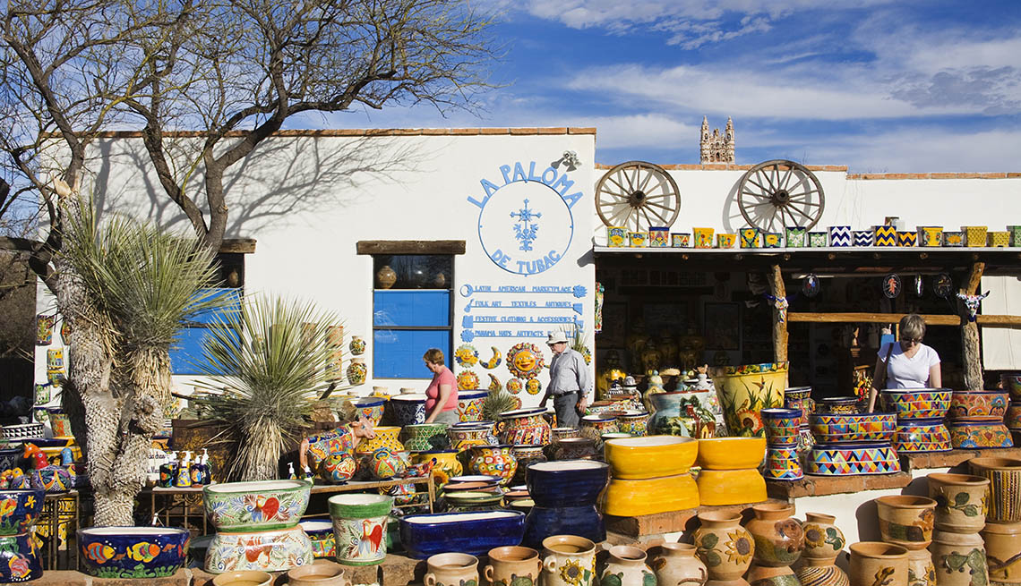 Customer Peruses Traditional Latino Pottery And Artwork At Local Store In Tubac Arizona, US Cities Rich In Hispanic Culture