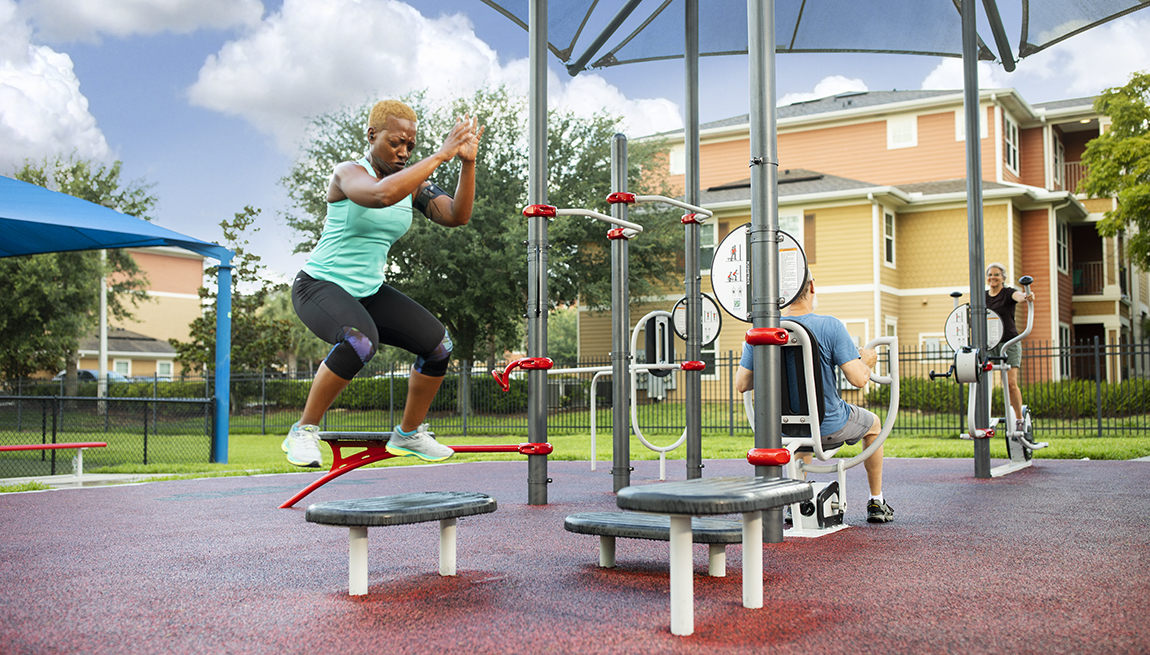 item 3 of Gallery image - people using exercise equipment at a public fitness park