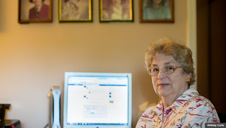 Sanny Moore, checks her Facebook accountto keep track of far-off family members. AARP Missouri