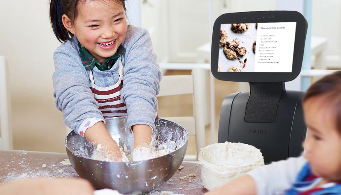 Temi robot reads recipe to kids baking