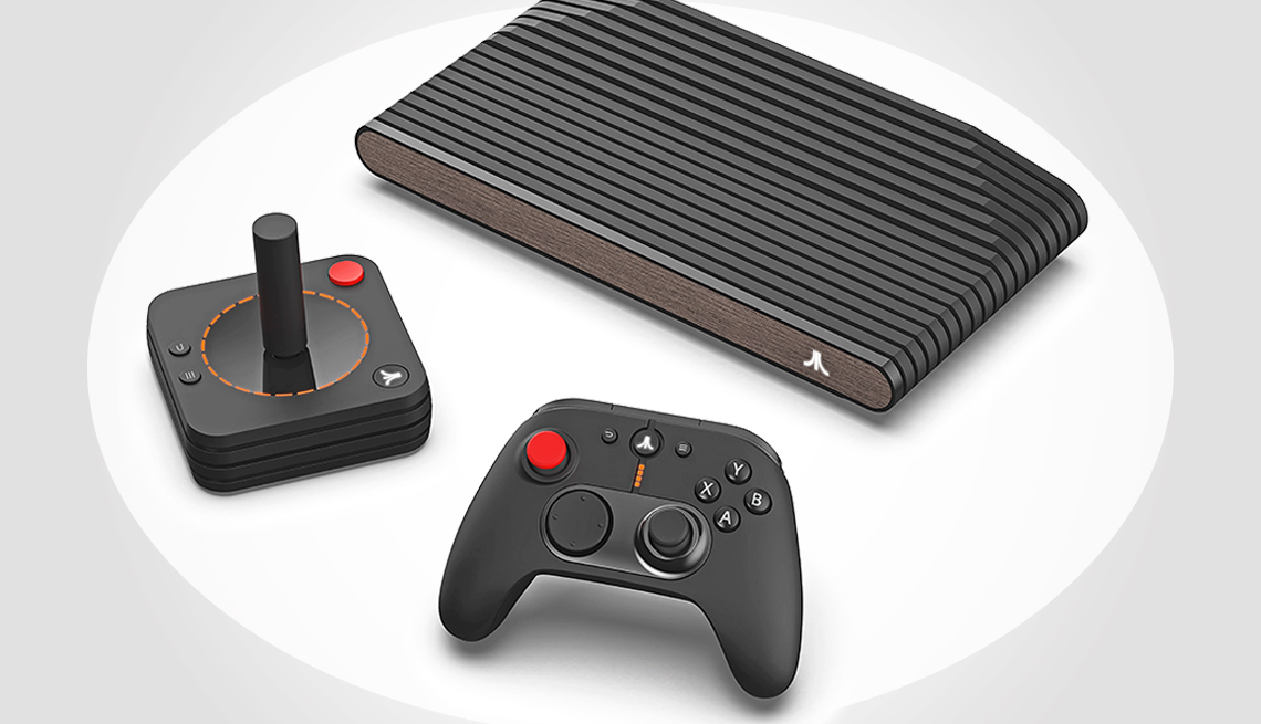atari gaming console and controllers