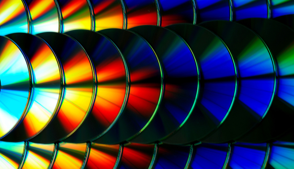 colorful cds arranged in rows