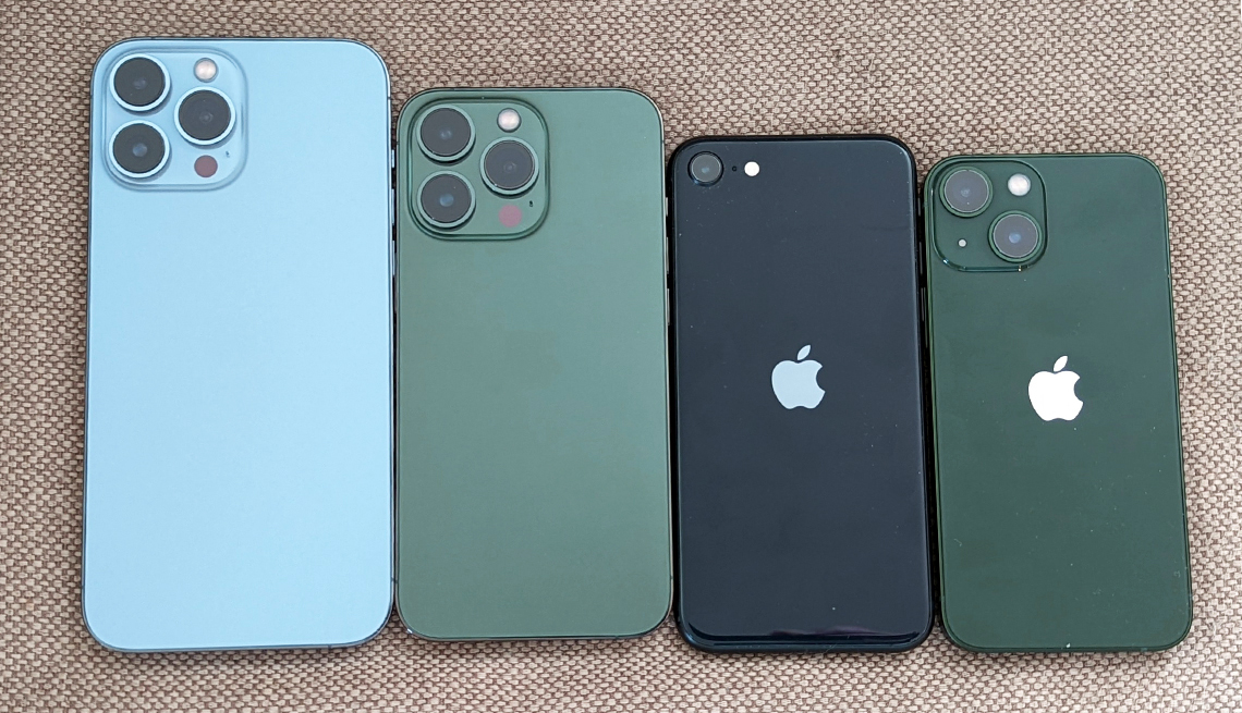 four different iphone thirteen models in varying sizes