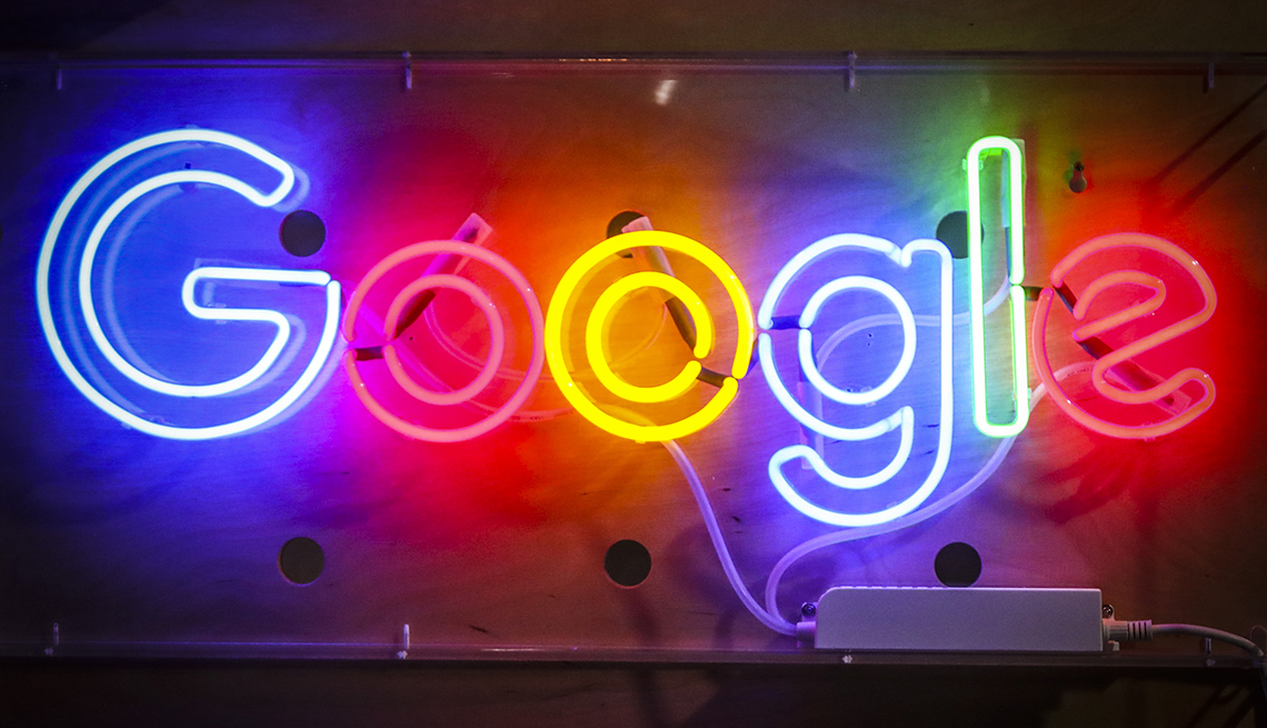 the google logo in neon letters