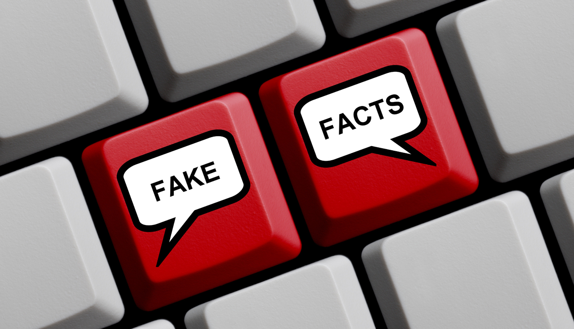 word bubbles showing the words fake and facts on red keys embedded in a gray keyboard