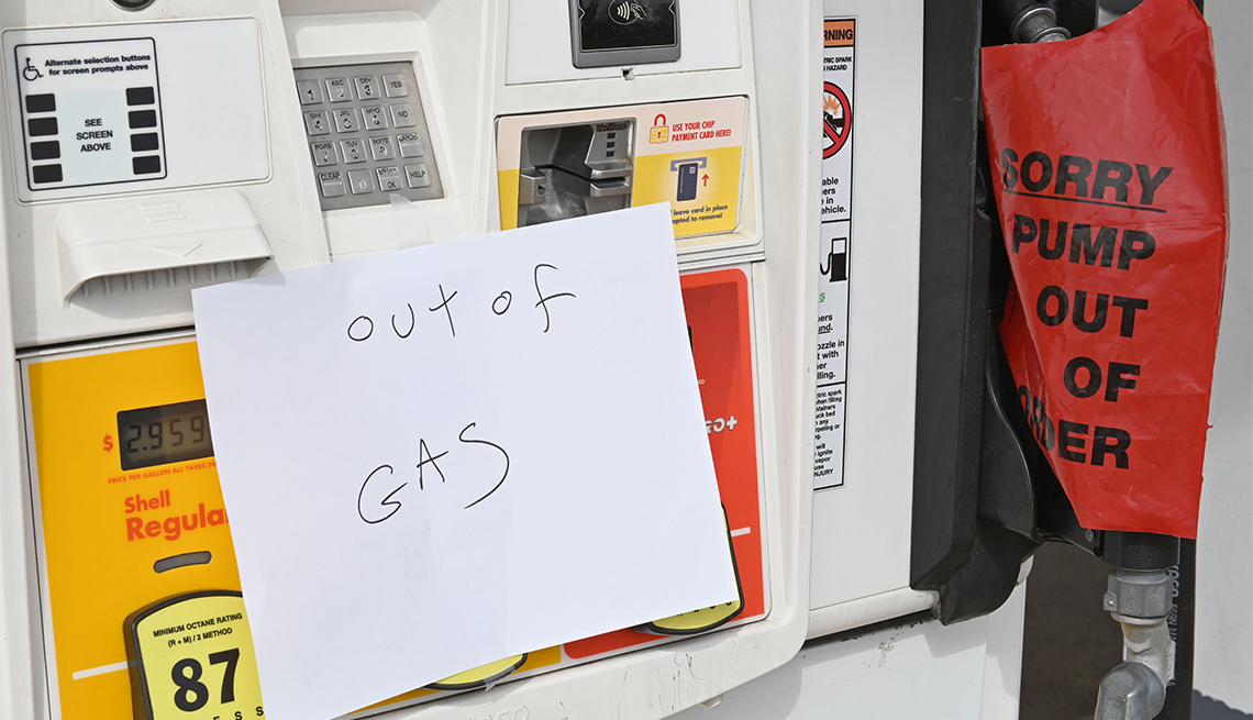 A note reading 'out of gas' is left on a gas pump at a gas station on May 12, 2021 in Arlington, Virginia