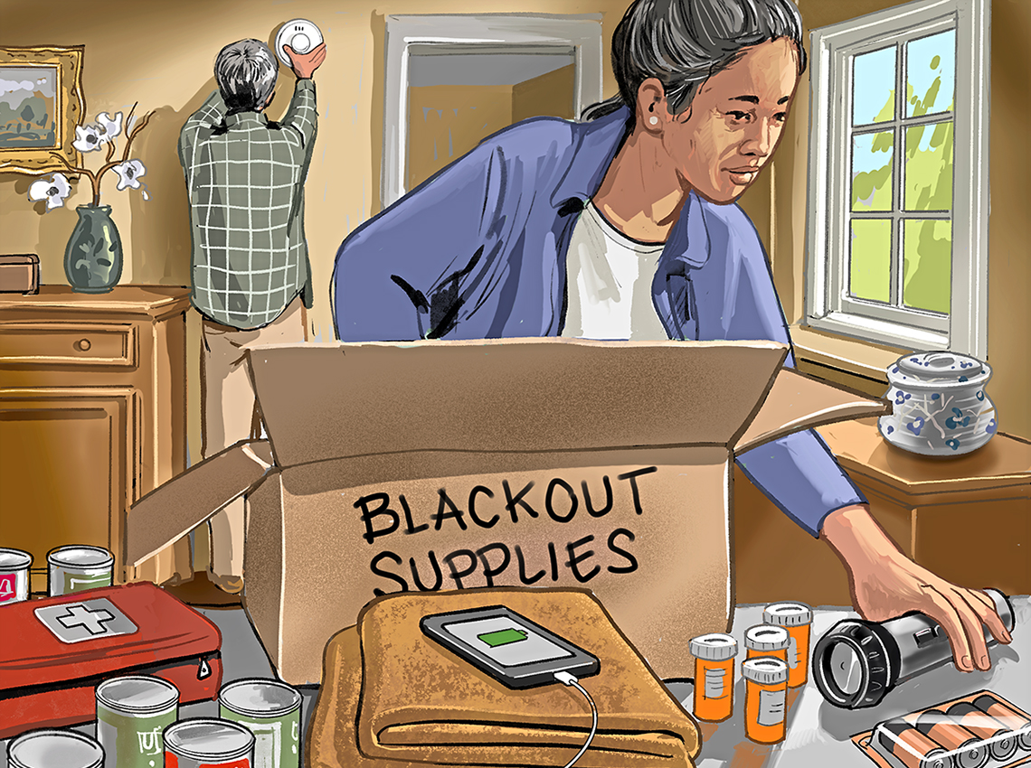 a couple assembling blackout supplies such as batteries a flashlight medicine and first aid