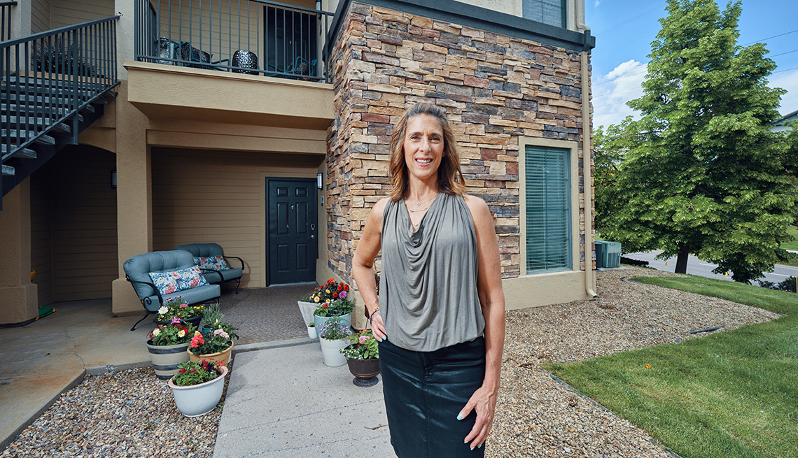 laura campbell in front of her new condo building in golden colorado