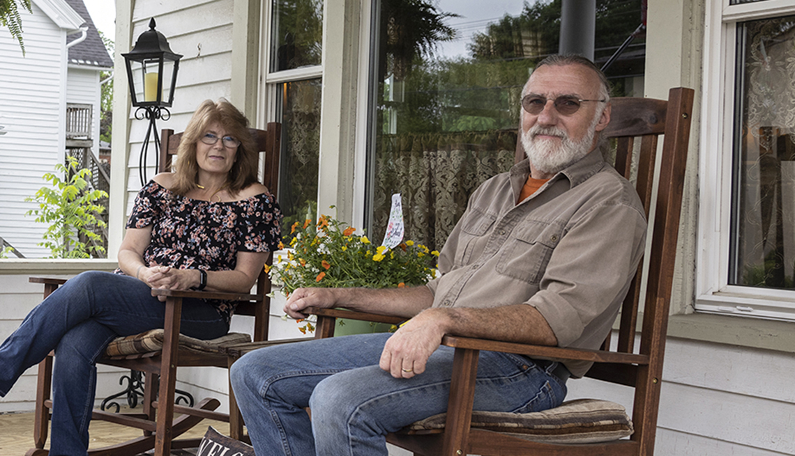 quinn and vivian golden sitting in rocking chairs on a porch