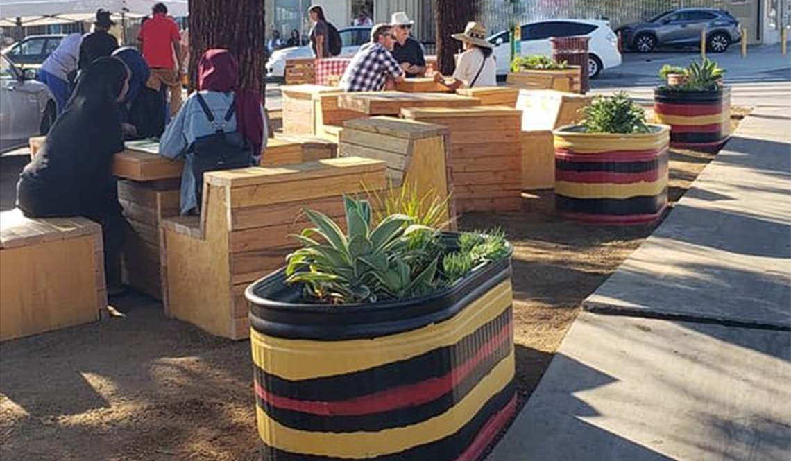 Planters and outdoor seating in the City Heights neighborhood of San Diego, California